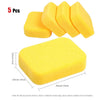 A set of five yellow high-density car wash sponges for auto detailing and waxing