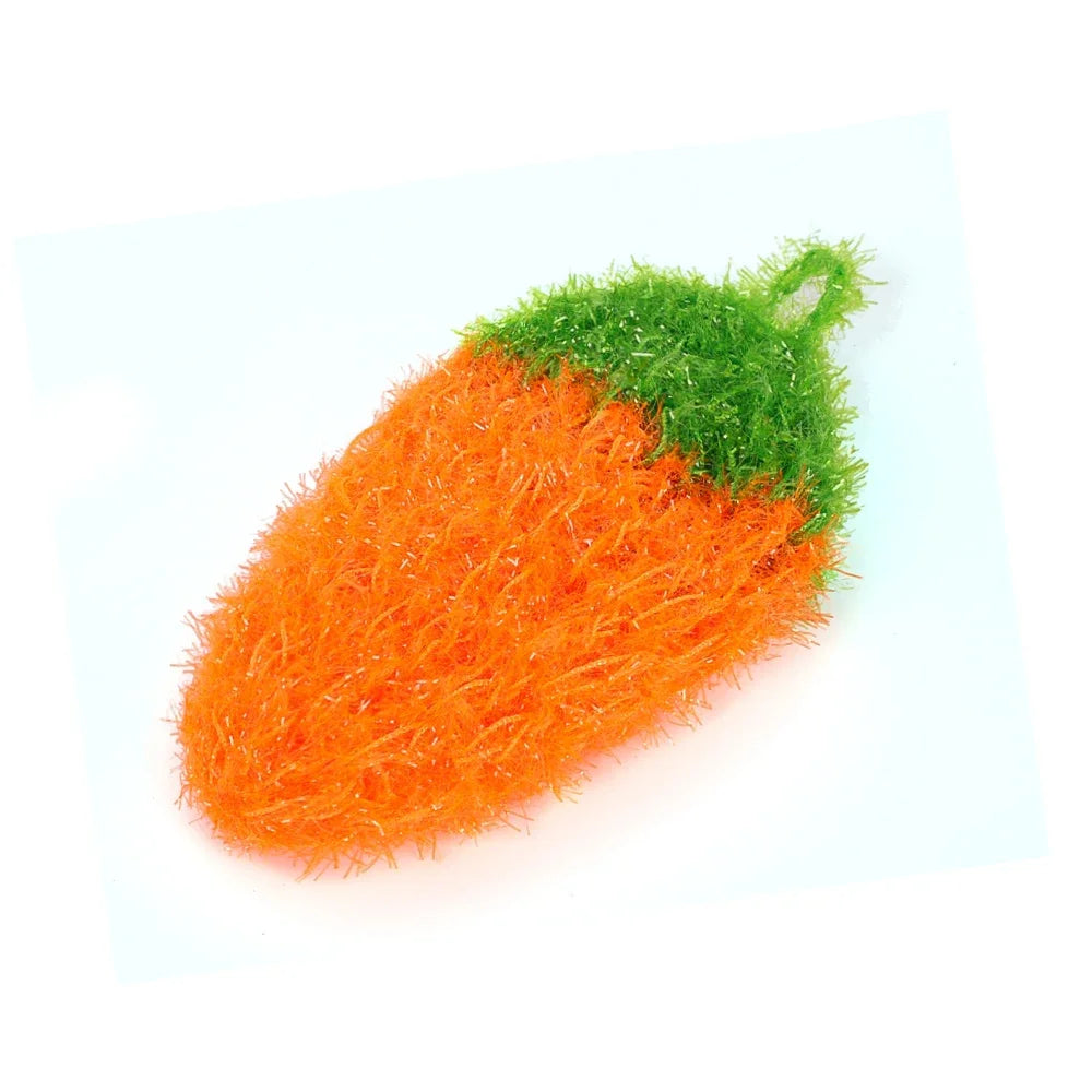 An orange strawberry scrubber sponge with green bristles resting on a white background.