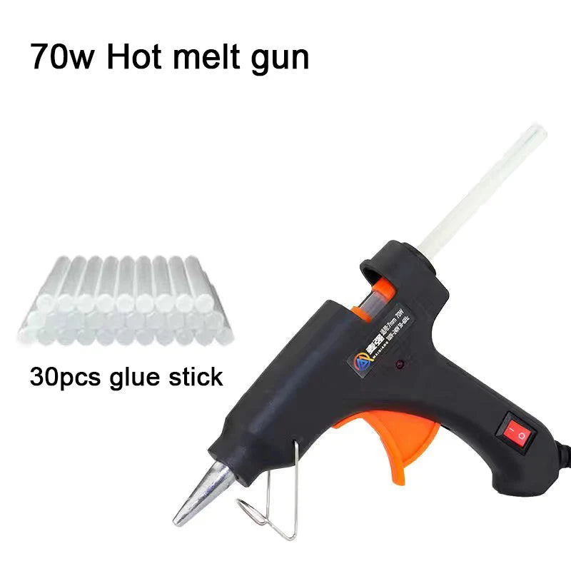 A black hot melt glue gun with a white stick and 30 pieces of glue sticks shown next to it.
