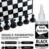 A set of black epoxy resin dye paste in a glass bottle next to a black and white checkered surface.