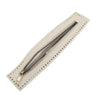 A beige leather zipper with a metal pull is shown diagonally against a white background.