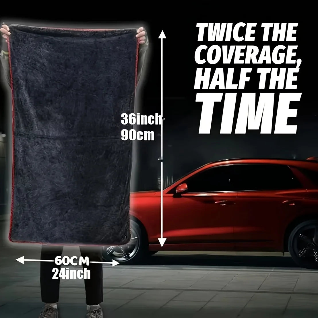 A person holds up a black microfiber car drying towel next to a red car, demonstrating its coverage and time-saving features.