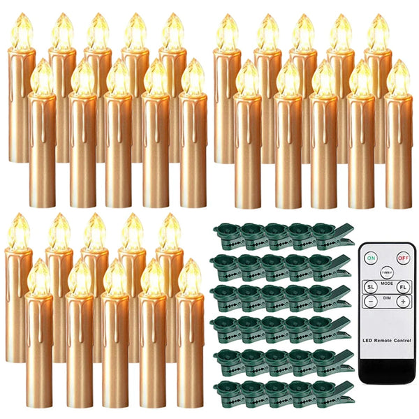 A set of brass-colored flameless LED candles with a remote control and battery pack.