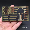 A rectangular tactical patch featuring a distressed American flag design with a silhouette of a Native American head.