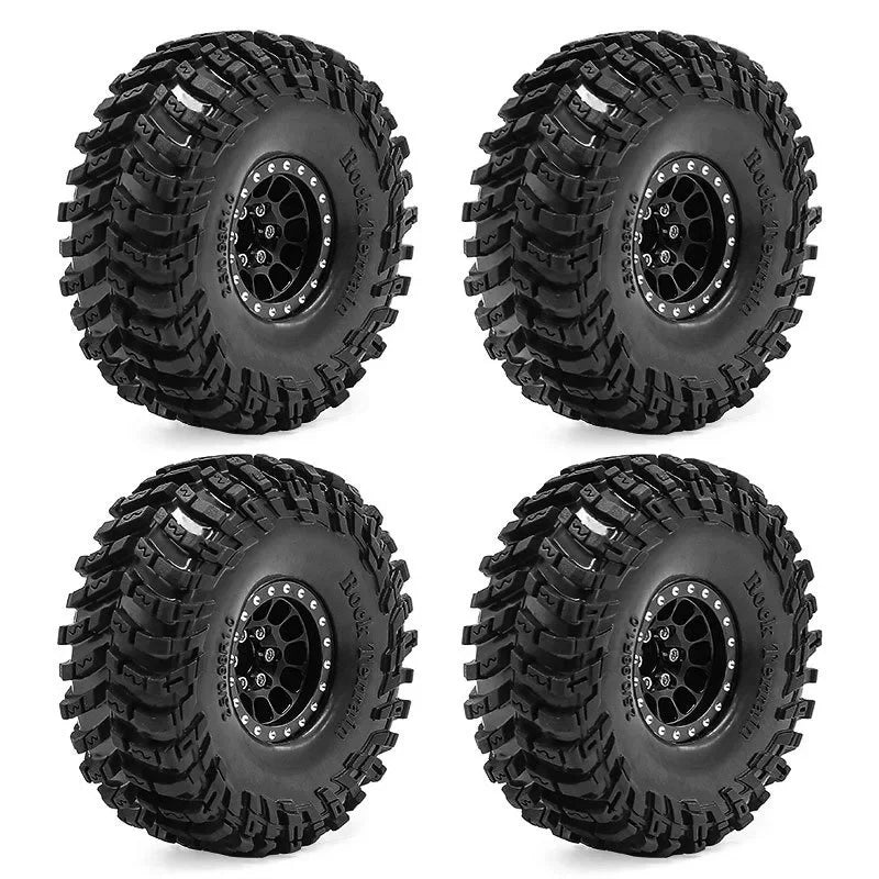 Set of four black metal beadlock RC crawler wheels with tires