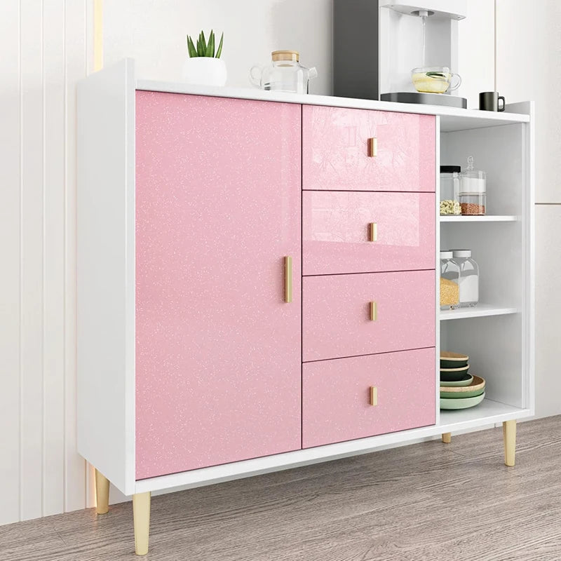 A white storage cabinet with pink glitter peel-and-stick vinyl doors and drawers displaying various items.