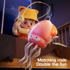 A pink octopus toy with tentacles is shown next to a child's head wearing a yellow hat.