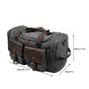 A gray canvas duffel bag with brown leather pockets and straps shown from the side.