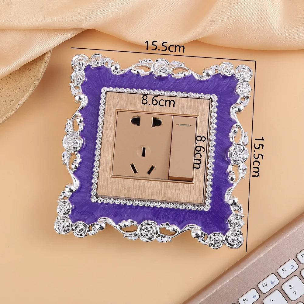 A rectangular switch cover frame with a purple border and silver decorative edges is shown on a light background.
