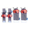 A set of black and white baby wrist and foot rattles featuring various patterns and colors.