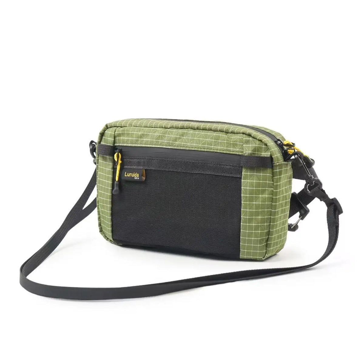A olive green and black checkered tactical waist bag with a black strap.