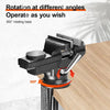 A black swivel clamp-on table vise with a 360 degree rotating base is shown on a wooden surface.