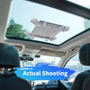 A Starlink Mini suction cup car mount is installed on a vehicle's sunroof, positioned above the dashboard.