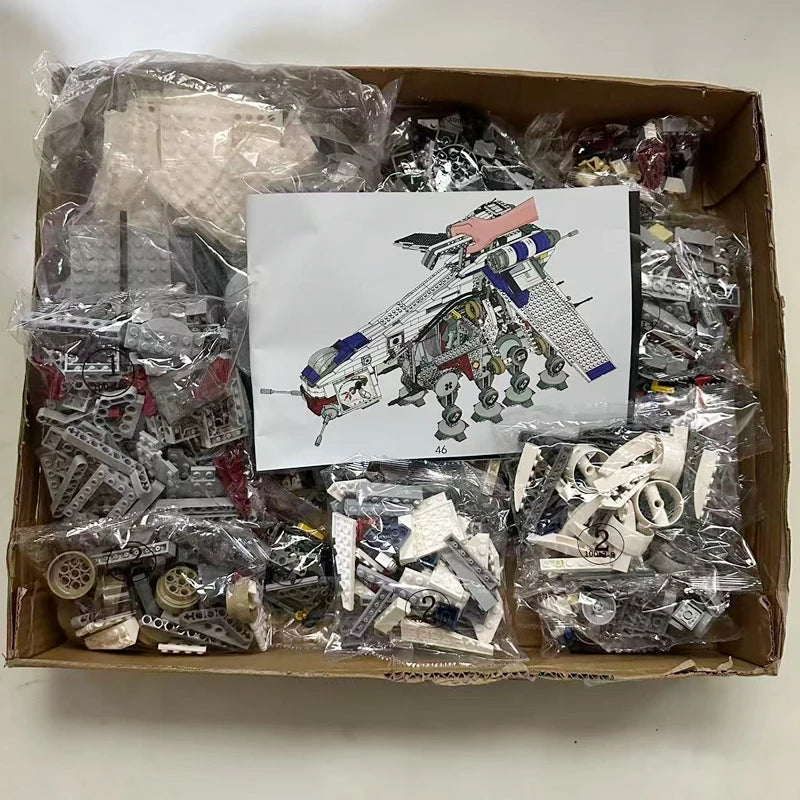 A box containing a large building block set of the Republic AT-OT Walker featuring various gray and white plastic pieces.