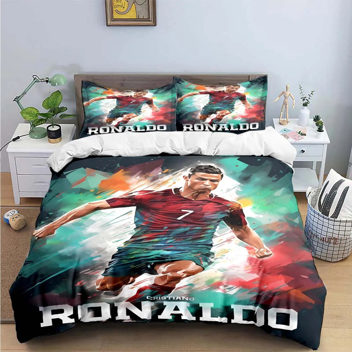 A soccer player graphic duvet cover featuring Cristiano Ronaldo in a red jersey and green shorts.