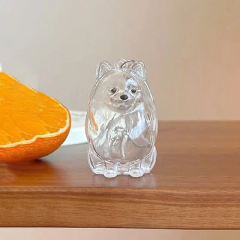 Clear glass pendant keychain shaped like a cute fox or squirrel