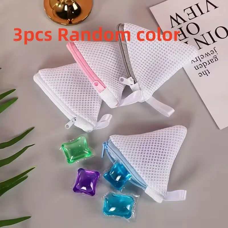 Three reusable mesh laundry bags in various colors including pink, white, green, purple, and blue.