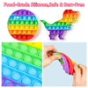 A colorful silicone fidget toy shaped like a dinosaur, showing various colors and textures.