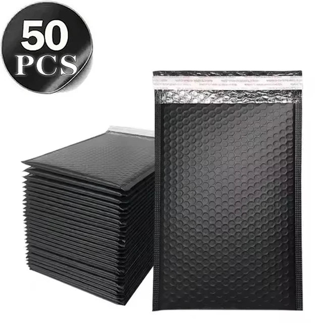 A stack of 50 black opaque bubble mailers with self-sealing adhesive.