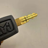 A brass ignition key is shown next to a black plastic key fob for a Caterpillar excavator replacement set.