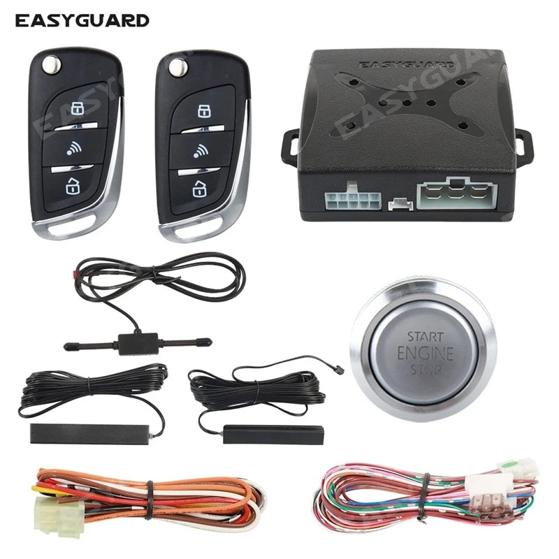 A collection of PKE keyless entry system components including a remote, a push button, and various wiring harnesses.