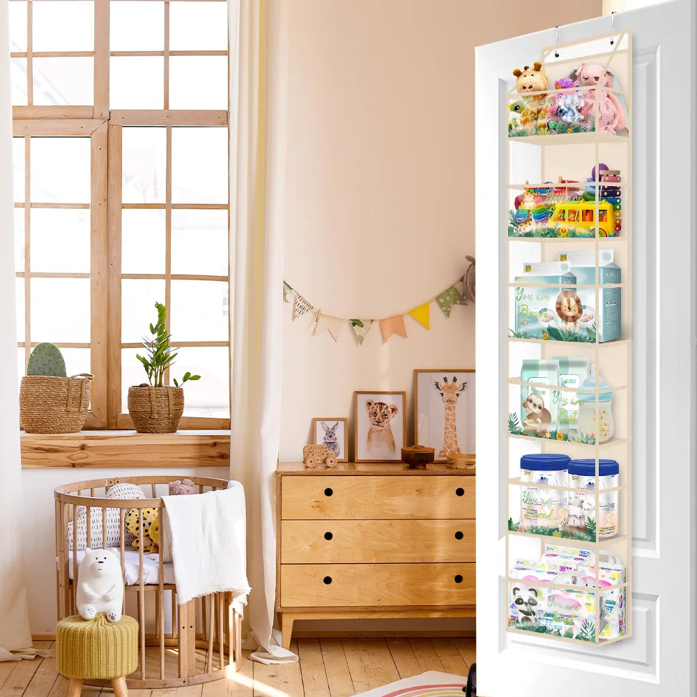 A wooden over-the-door hanging organizer with clear compartments is displayed next to a window and a wooden dresser.