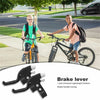 A pair of black brake levers for a bicycle, shown next to a child riding a bike.