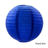 A royal blue round paper lantern with vertical folds.