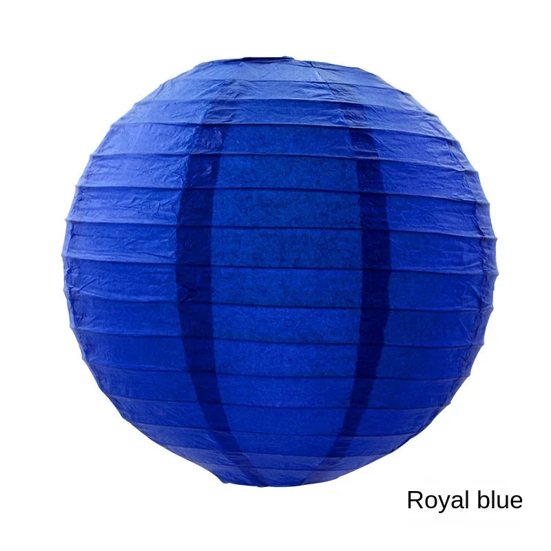 A royal blue round paper lantern with vertical folds.