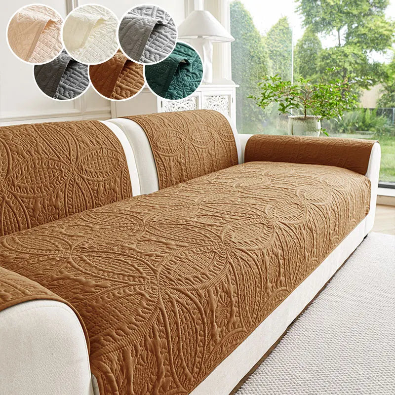 A brown plush sofa cover with a textured pattern is displayed indoors next to a window.