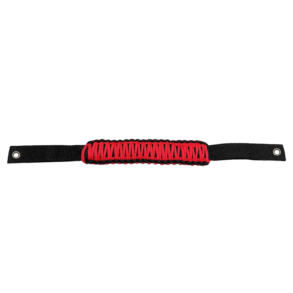 Black paracord grab handles with red accents for a vehicle.