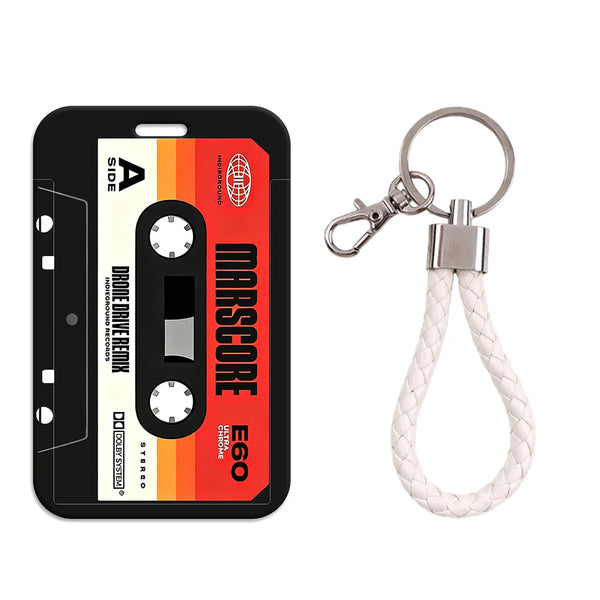 A black card holder featuring a Marscore drone drive remix and an attached keychain.