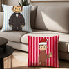 A red and white striped pillow featuring a cartoon depiction of Curious George.