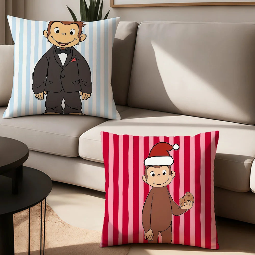 A red and white striped pillow featuring a cartoon depiction of Curious George.