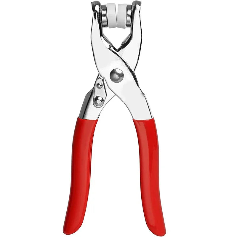 A pair of red and silver metal pliers with snap buttons for DIY sewing projects.