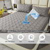 A gray waterproof mattress protector is shown on a bed, highlighting its features like waterproof, soft, breathable, and nois