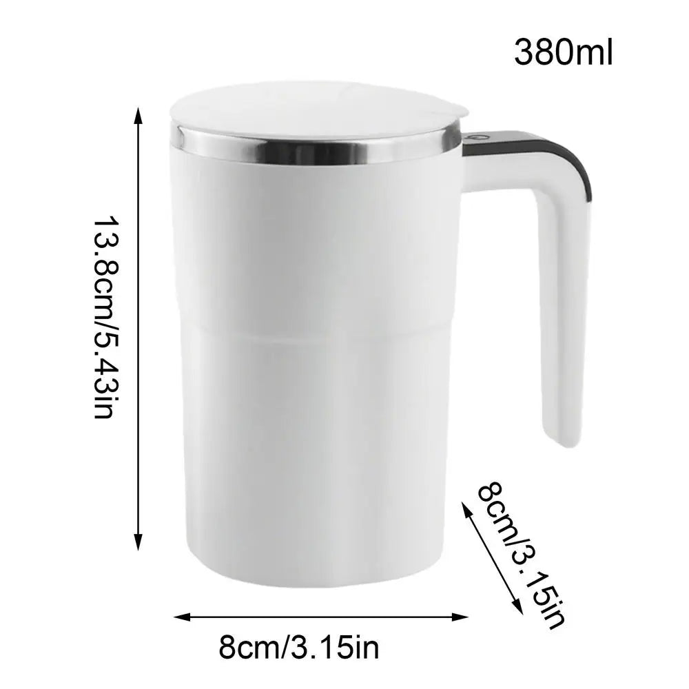 A white electric stirring mug with a handle and temperature display, shown in a side view.