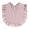 A light pink, textured cotton baby bib in a bandana style with ruffled edges and a small button closure.