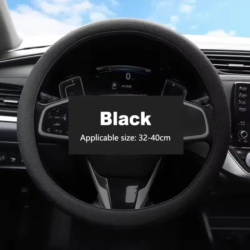 Black universal silicone steering wheel cover for a car, shown in a close-up view.