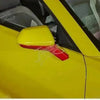 Yellow exterior trim and red interior trim kit for a Chevrolet Camaro car door panel.