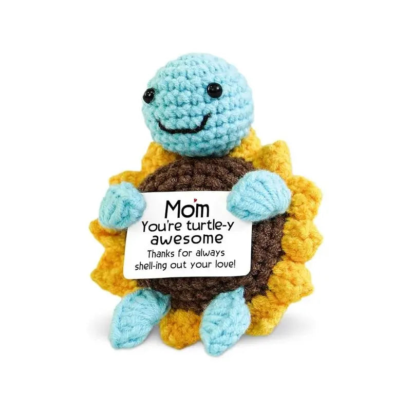 Handmade crochet hedgehog doll with a smiling face and an inspirational card