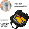Black insulated aluminum foil lunch bag with a yellow lemon inside