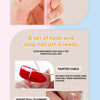 A set of hook and loop nail art is ready featuring a pink applicator brush and various nail art designs.