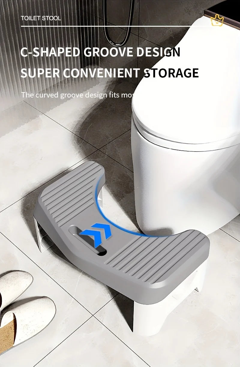 A toilet stool with a C-shaped groove design is shown next to a toilet bowl on a tiled floor.