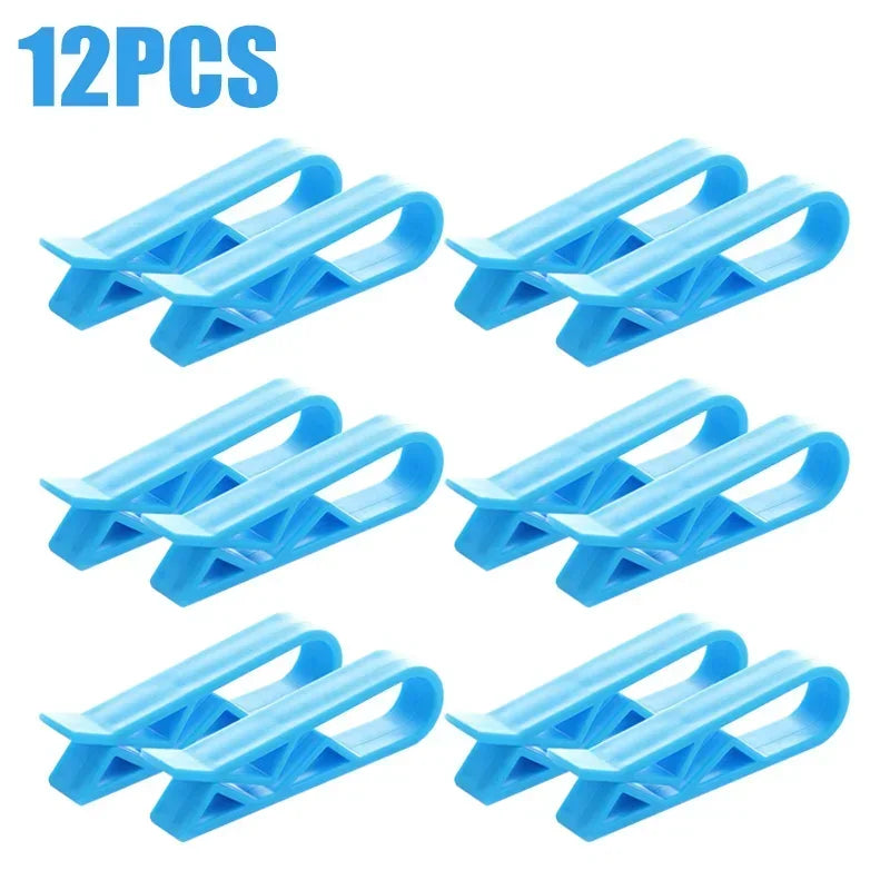 Twelve blue plastic clips designed to hold garbage bags or snack bags on trash cans.