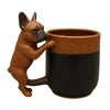 A terracotta-colored coffee mug with a dachshund puppy head handle.