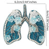 A pair of sparkling beaded rhinestone patches shaped like wings in teal and white flowers for clothing and crafts.