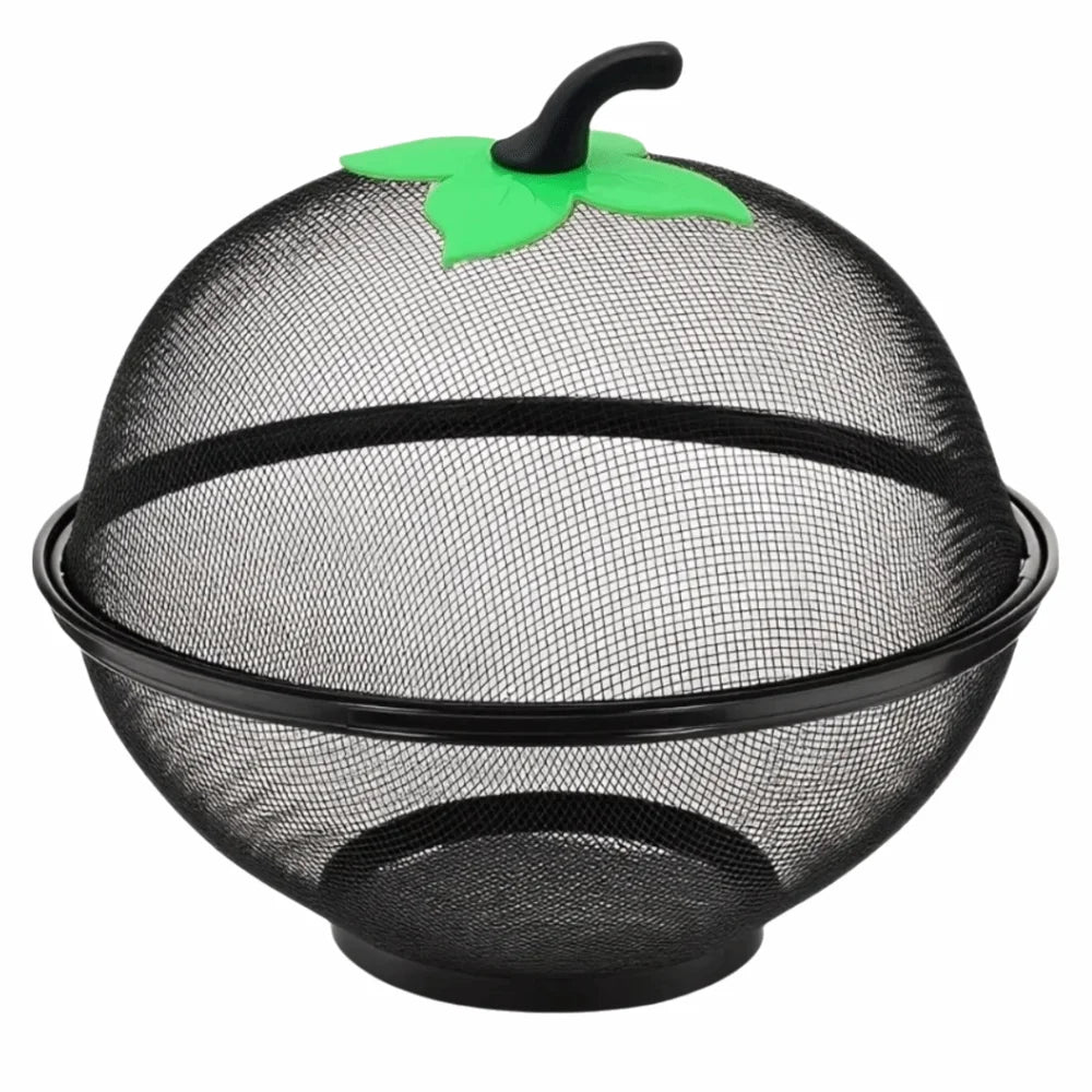 Black metal fruit basket with a mesh cover and a green leaf decoration