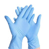 A pair of light blue nitrile disposable gloves shown in a close-up view.