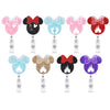 A set of nine colorful nurse badge reels featuring Mickey Mouse faces in various pink, blue, and red glitter and solid colors
